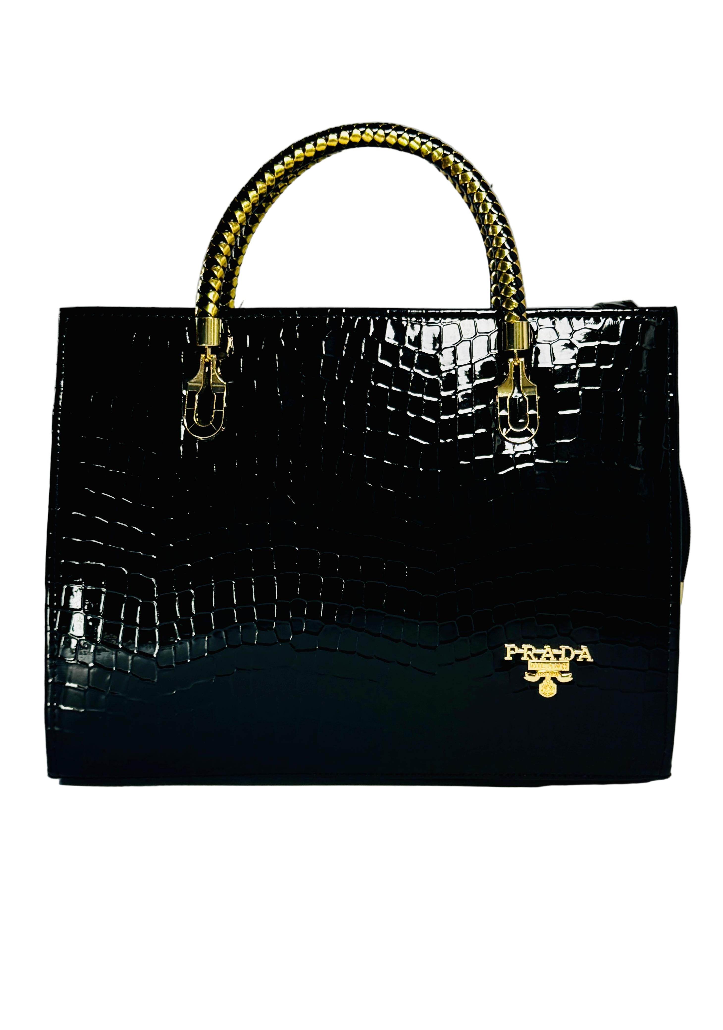 Black crocodile-patterned handbag with gold accents on a light gray background