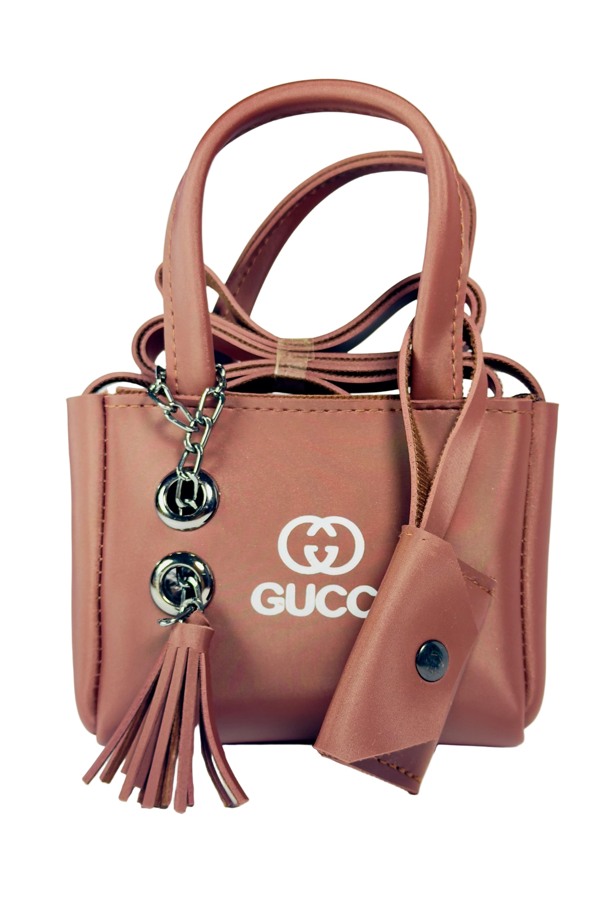 Pink Gucci handbag with tassel on a white background