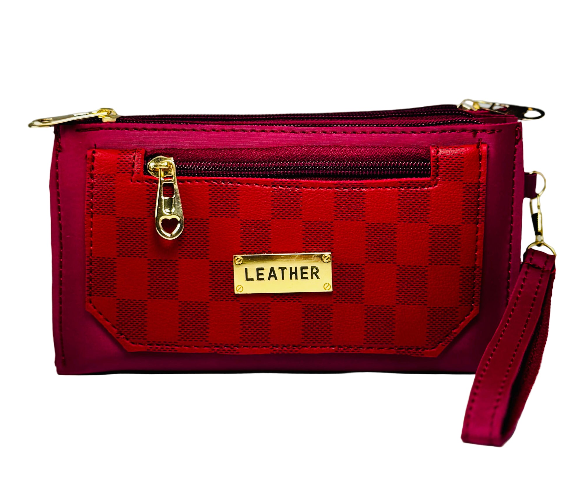 Red checkered handbag with gold accents on a gray background
