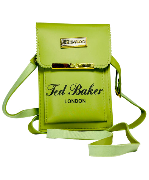 Green handbag with 'Ted Baker London' branding on a white background